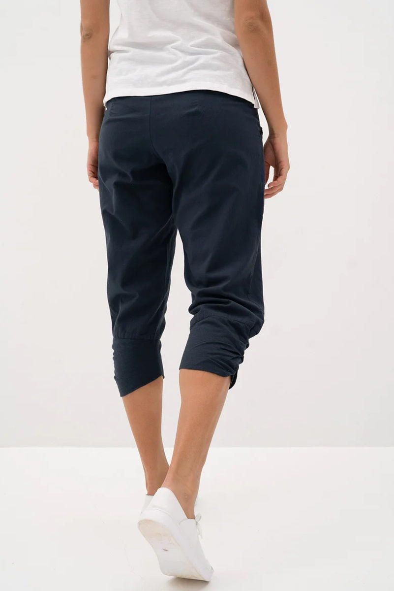Woman wearing Humidity Lifestyle HS31010 Castaway Pant Navy back view