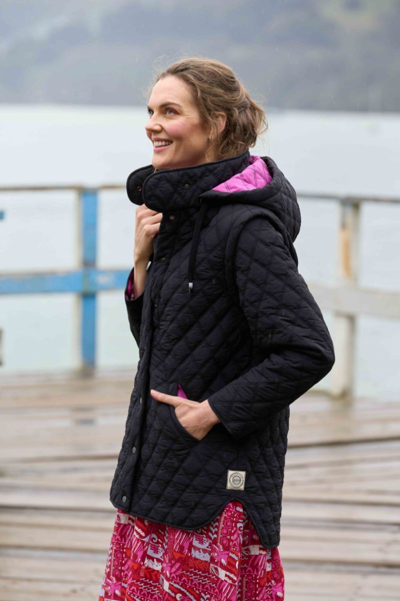 Woman wearing Wellington Jacket in Black by Charlie Jane closeup