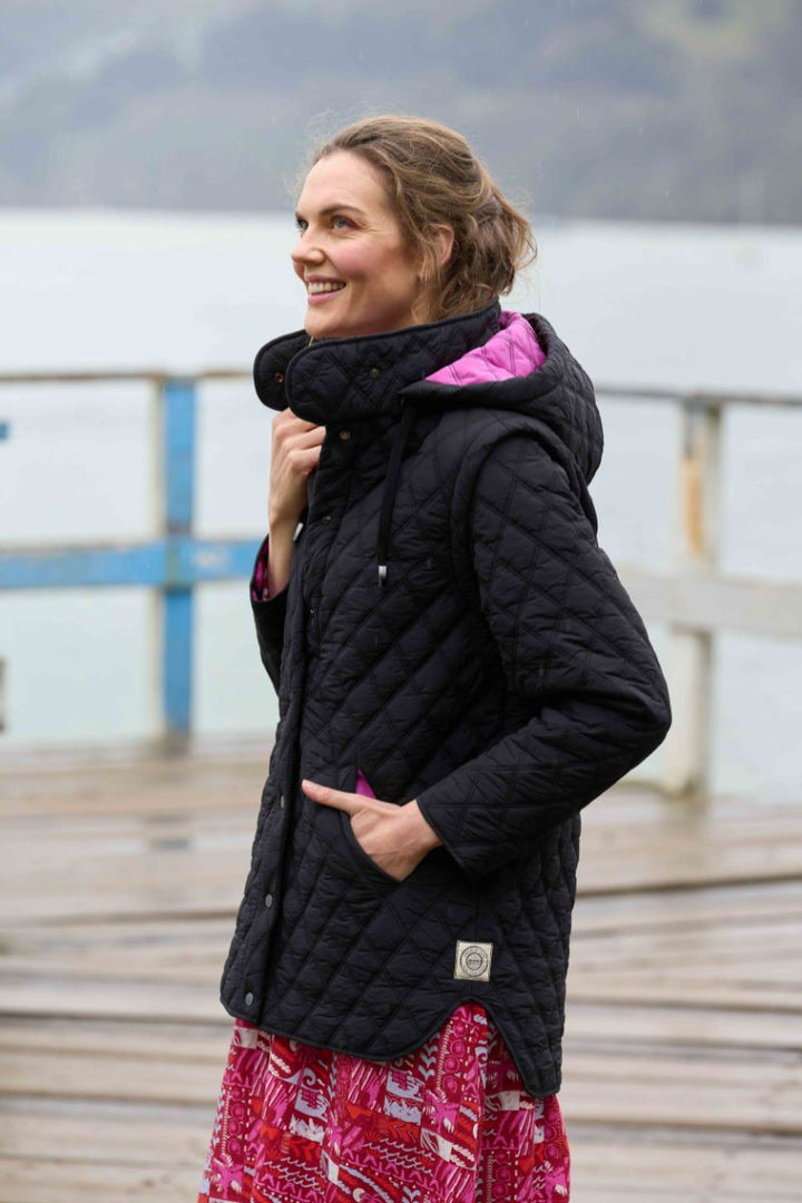 Woman wearing Wellington Jacket in Black by Charlie Jane closeup