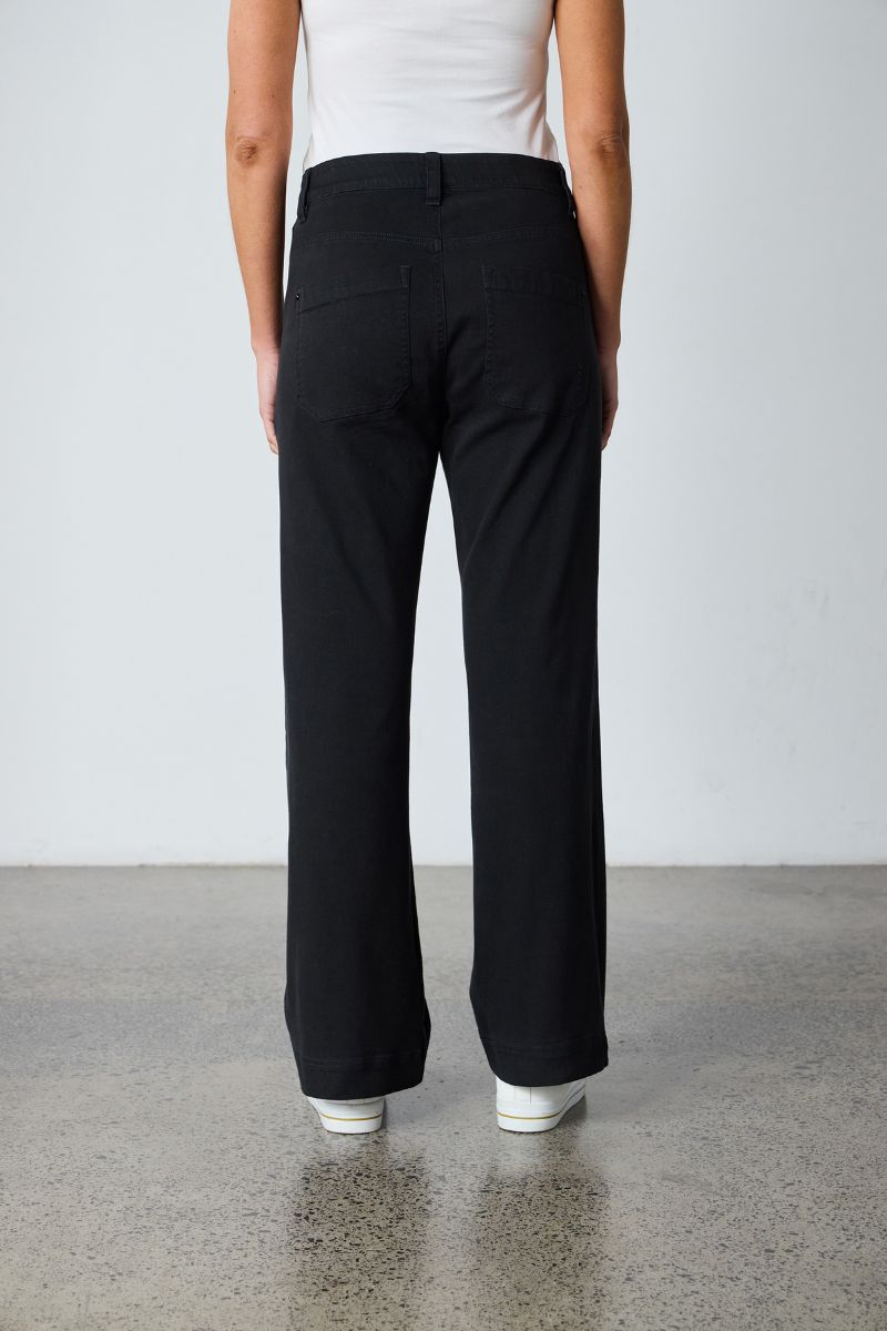 Woman wearing Lania Chrome Jean in black NLA3920 back view