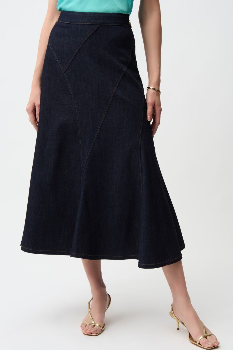 Woman wearing Joseph Ribkoff 261969 Denim Flare Skirt with Exposed Zipper fabric close-up in Dark Denim