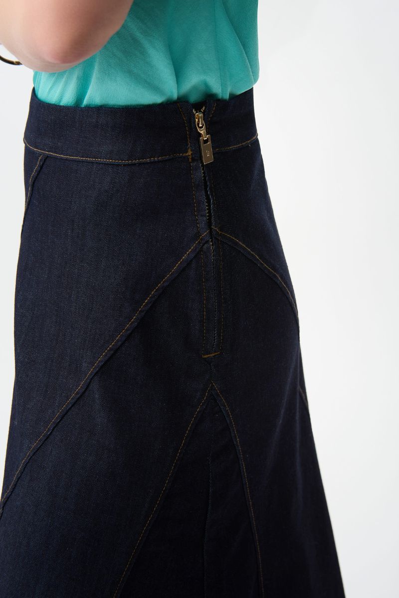 Woman wearing Joseph Ribkoff 261969 Denim Flare Skirt with Exposed Zipper side view in Dark Denim