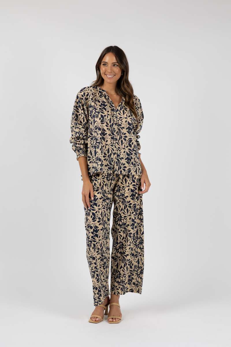 eden-pant-in-navy-print-humidity-lifestyle-front-view_1200x