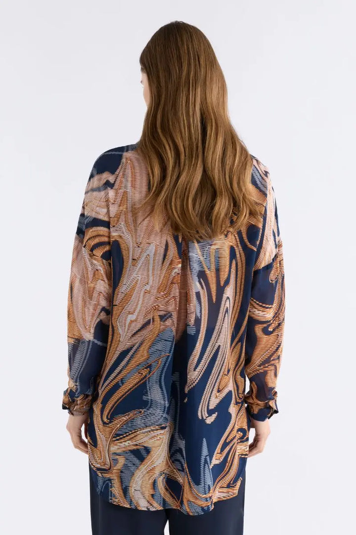 Woman wearing Eir Sheer Shirt in Brandr Print by ELK the Label style A1592 back