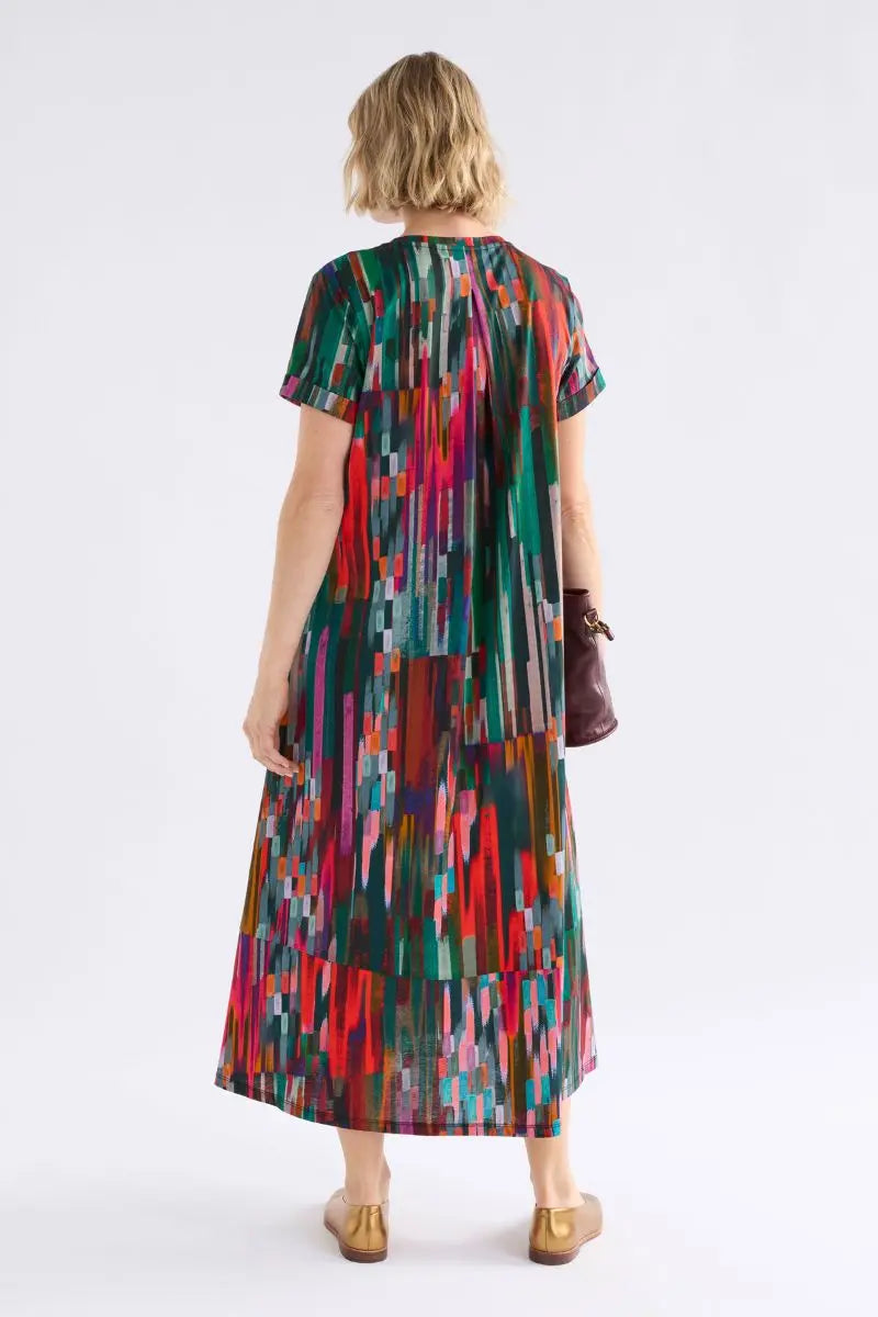 Woman wearing Haki Dress in Mella Print by ELK the Label back