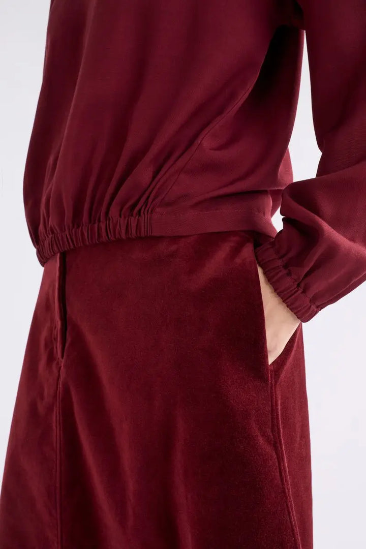 Woman wearing Altes Skirt in Merlot by ELK the Label closeup