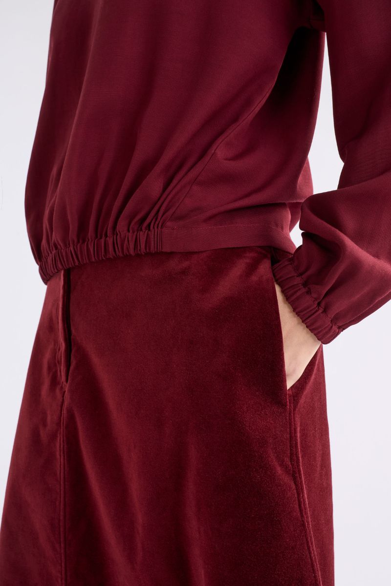 Woman wearing Altes Skirt in Merlot by ELK the Label closeup