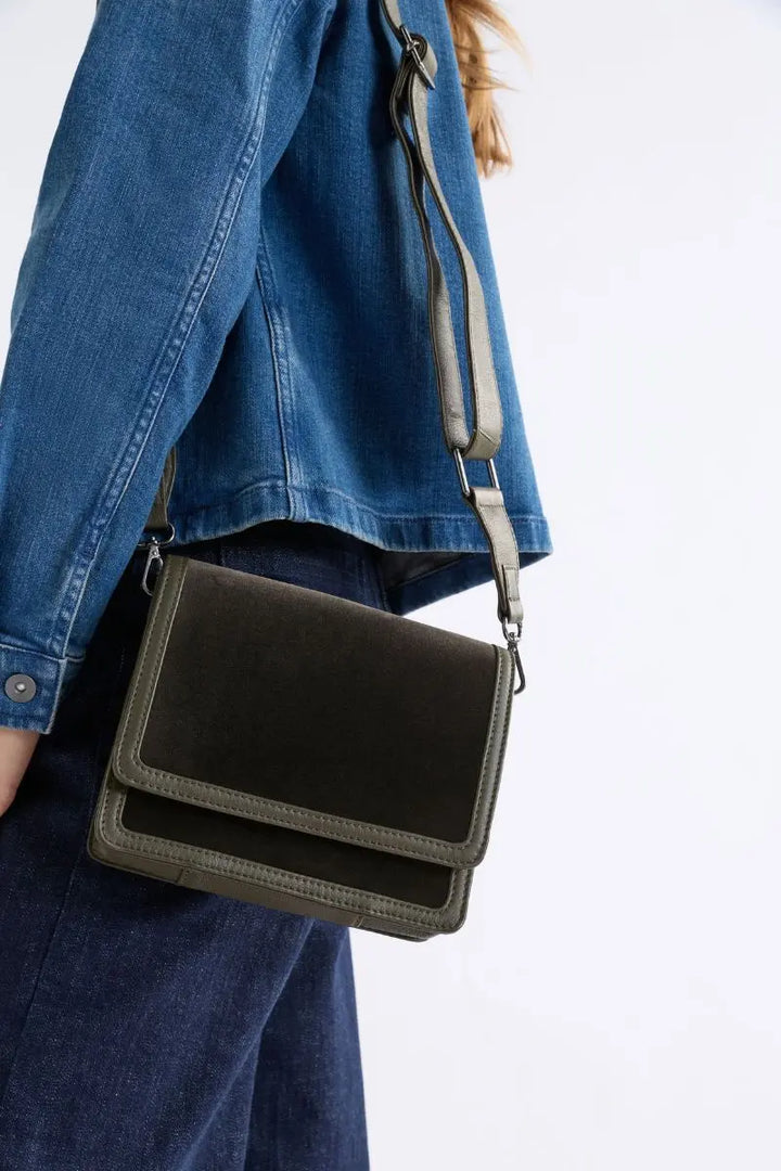 Woman wearing Vel Crossbody Bag in Dark Olive by ELK the Label style LO250