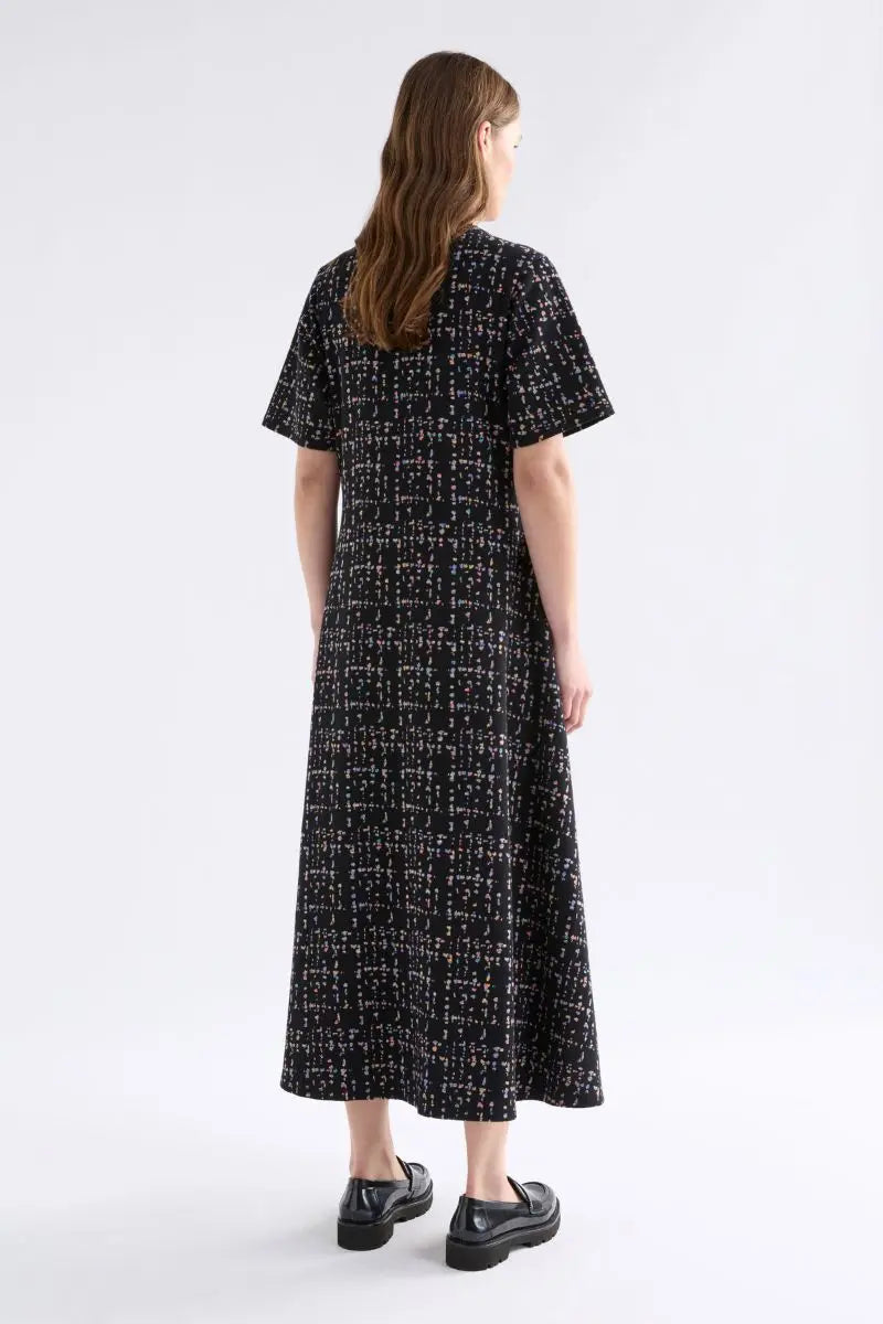 Woman wearing Mohr Long Dress in Black Fleck by ELK the Label back