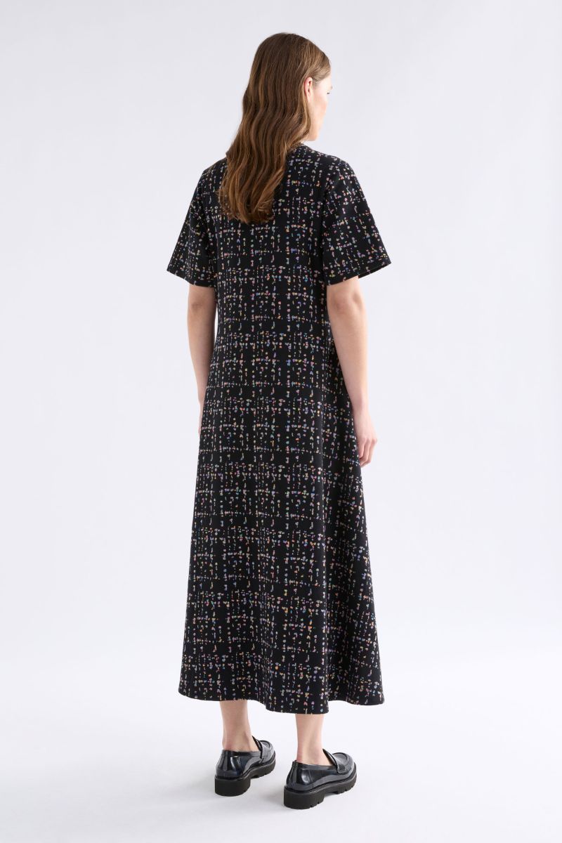 Woman wearing Mohr Long Dress in Black Fleck by ELK the Label back