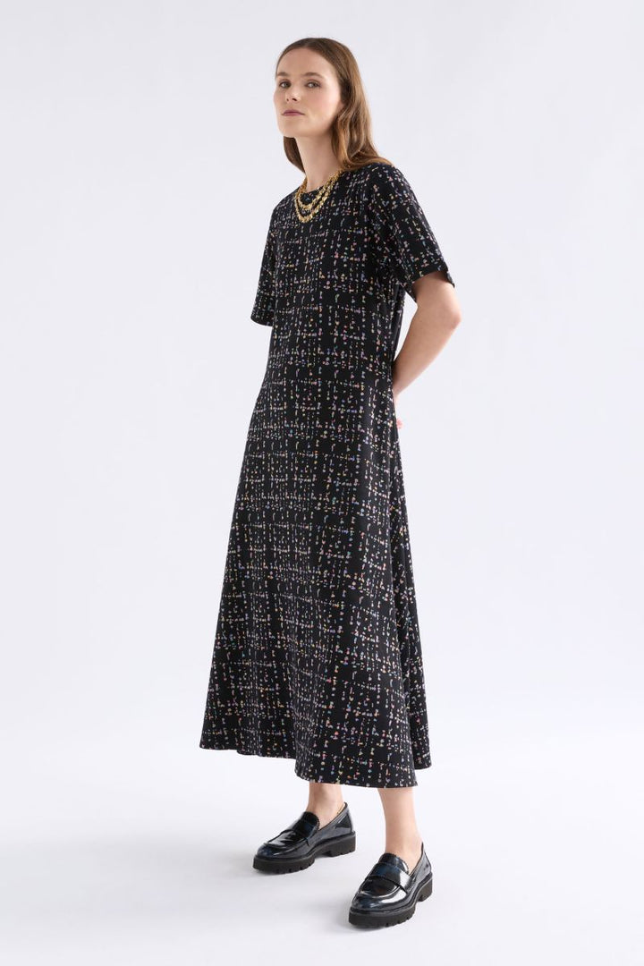 Woman wearing Mohr Long Dress in Black Fleck by ELK the Label front