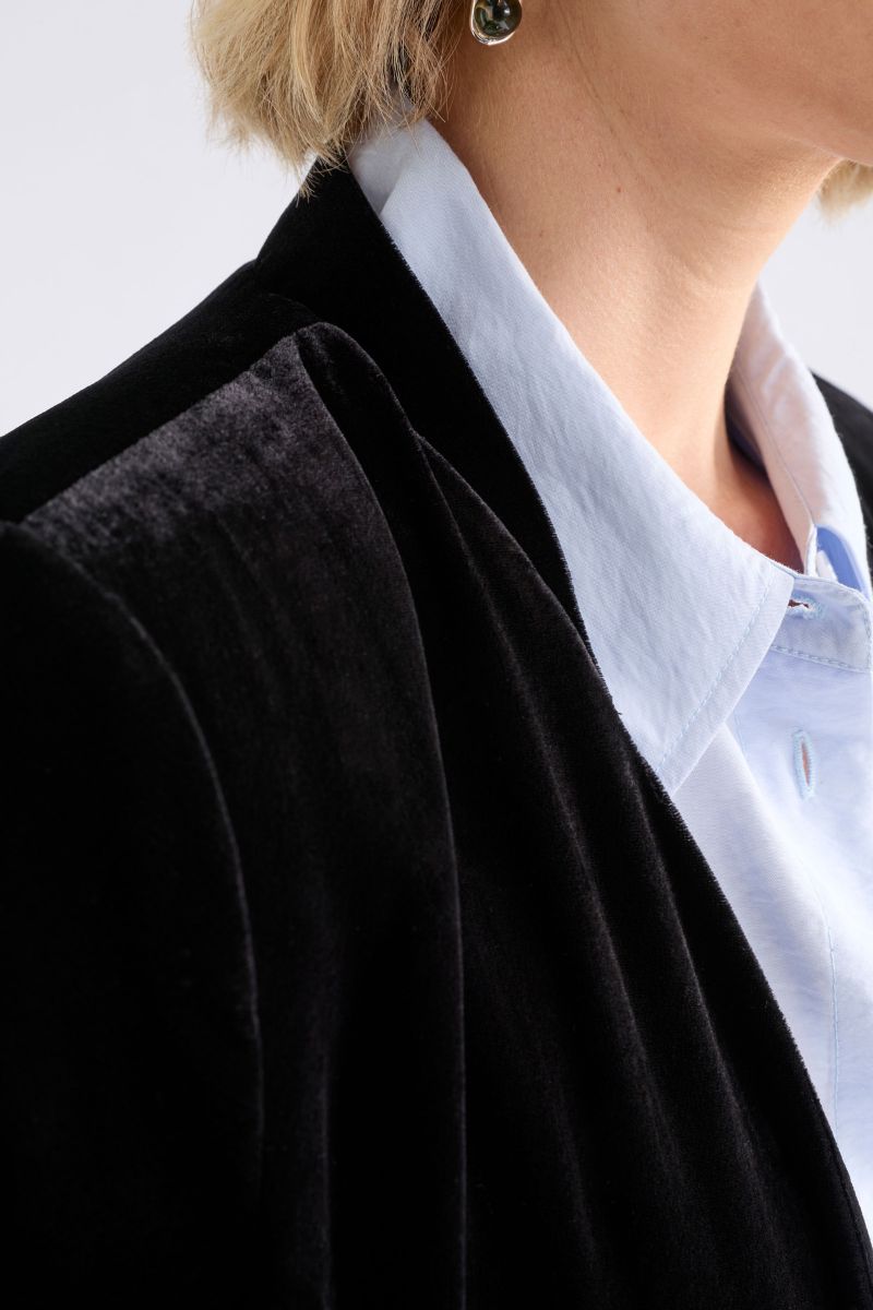 Woman wearing Velvet Soft Blazer Jacket in Black by Elk the Label closeup