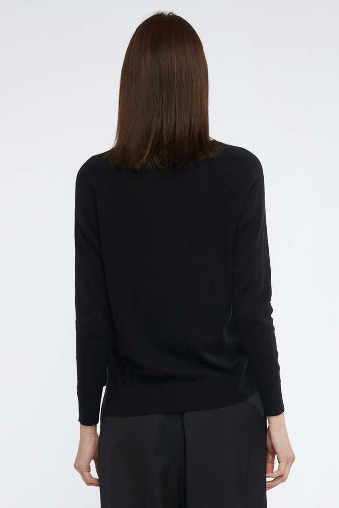 essential-v-in-black-zaket-and-plover-back-view_1200x