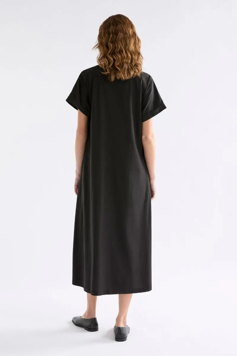 Woman wearing Elk the Label Etienne organic cotton dress back view