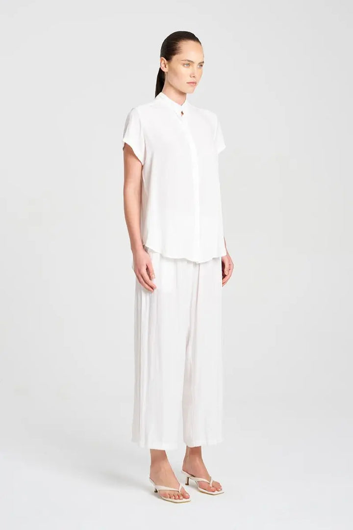 Woman wearing Mela Purdie F67 8629 Soft Stand Shirt in White side view