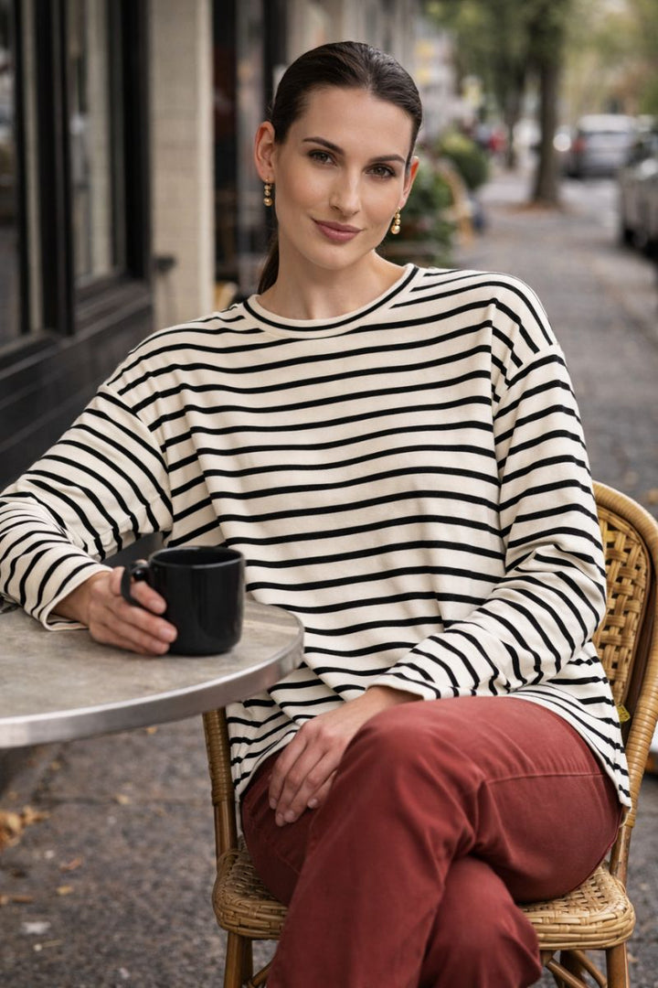Woman wearing Foil FO8442 Smooth Talker Sweater in Stripe front view