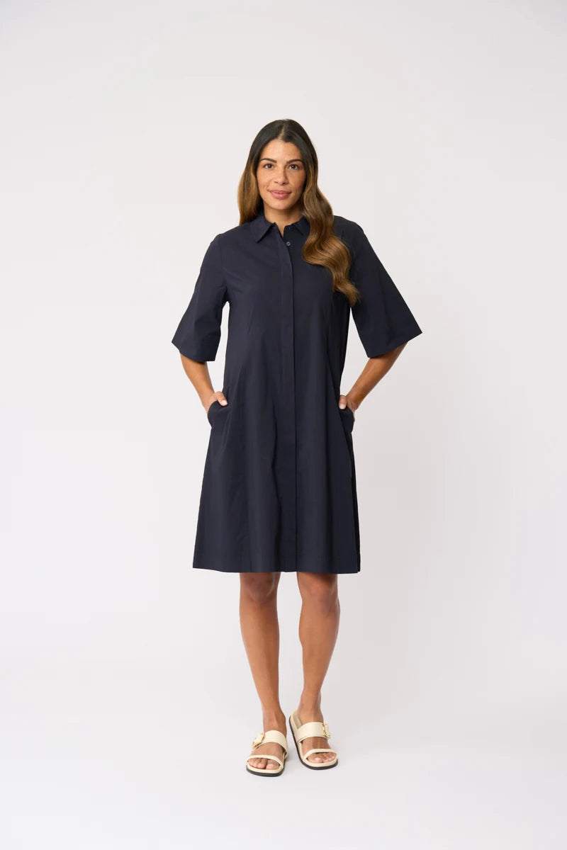 Foil Stitch Savvy Dress FO8666 in True Navy worn without the belt, front view showing relaxed shape and side pockets.