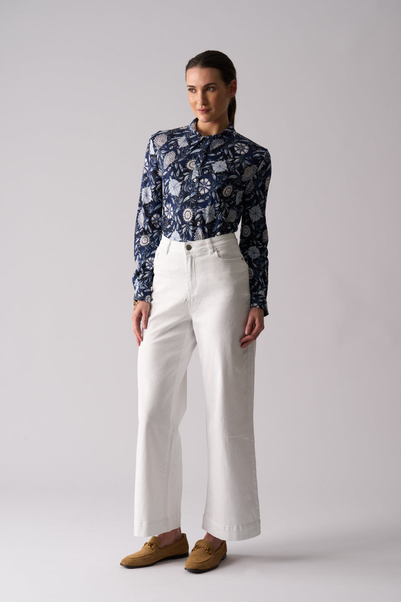 Woman wearing Risky Business Top in Bali blue floral print by FOIL FO8403 front outfit view