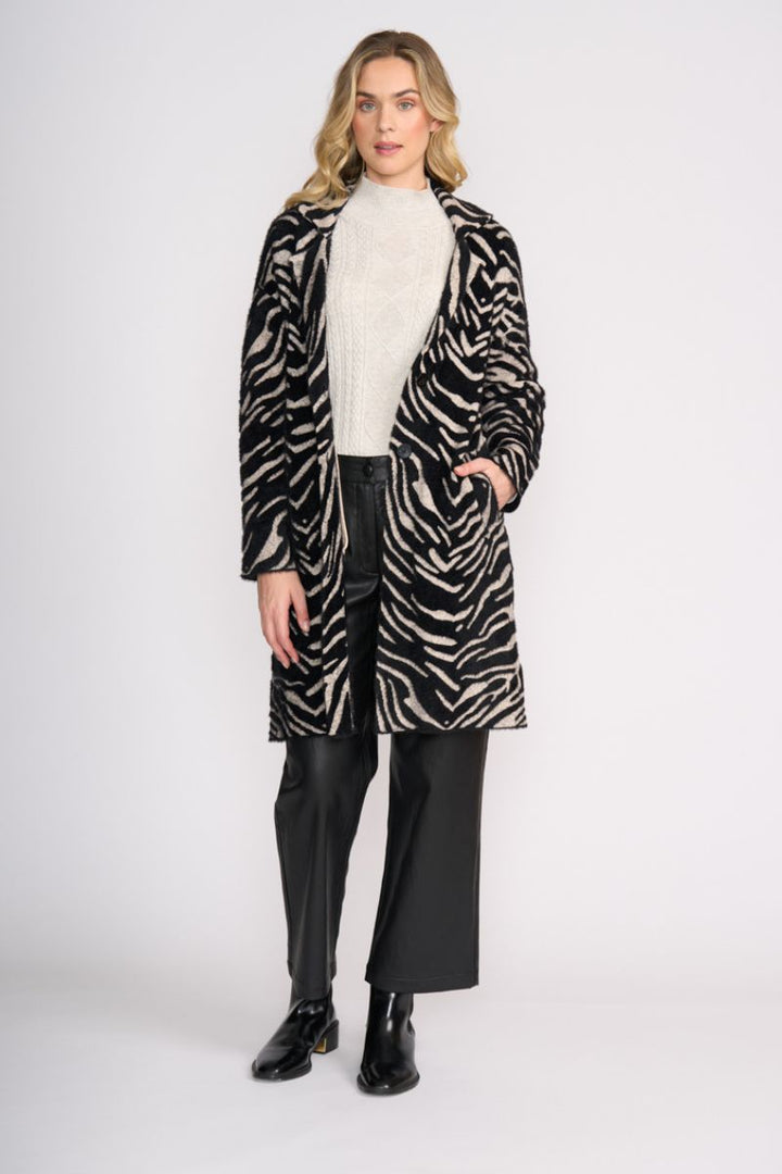 Woman wearing Lash Queen Coat in Zebra by Foil detail