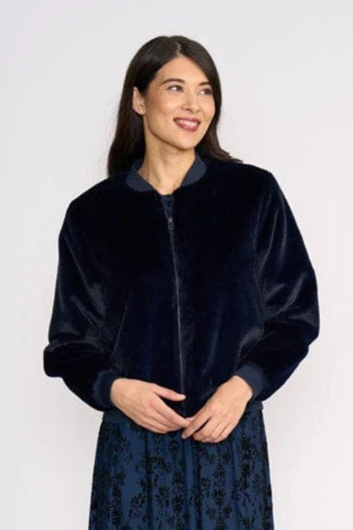 Woman wearing Fur Sure Aviator Jacket in Midnight by Foil closeup