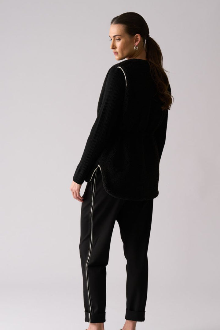 Woman wearing Top Kat Reversible Gilet in Black by Foil back