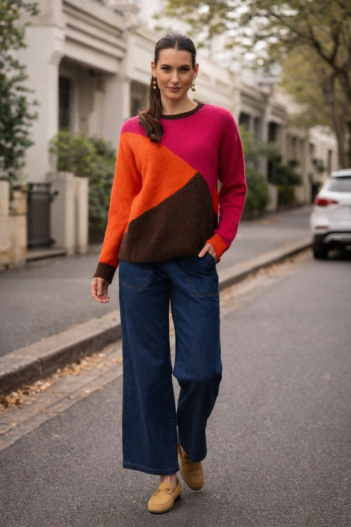Soft knit sweater in pink multi tones with relaxed fit and lightweight warmth. A vibrant everyday piece, available now at Weekends.
