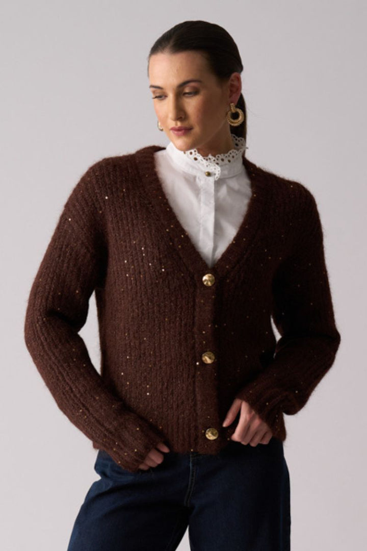Woman wearing Glow Getter Cardigan in Coffee by Foil closeup
