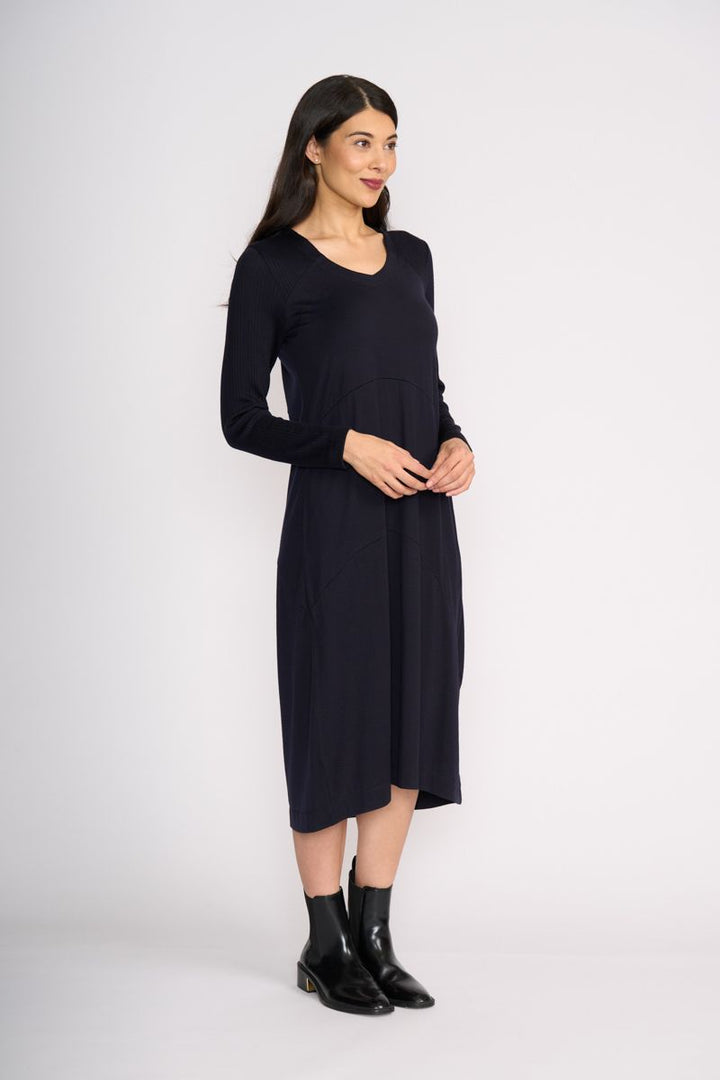 Woman wearing Upper Cut Dress in Night Sky by Foil side