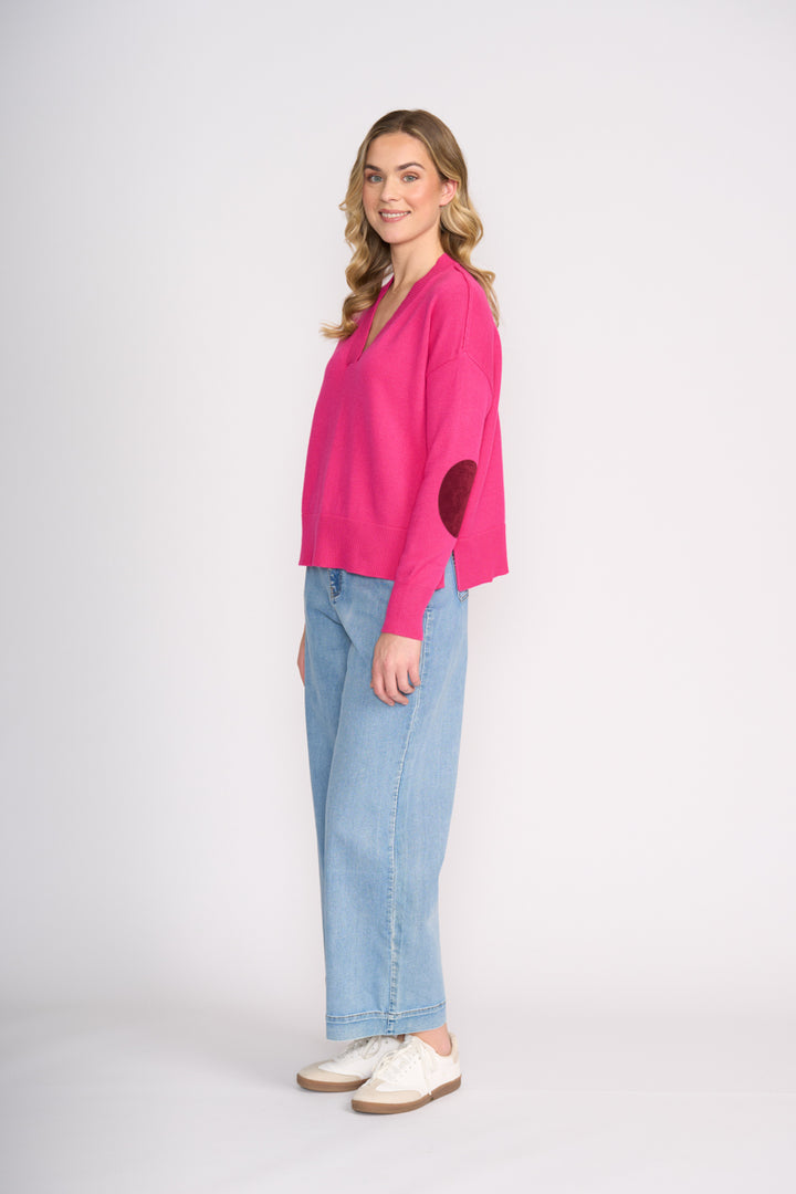 Woman wearing FOIL Perfect Patch Sweater FO8458 showing elbow patch detail