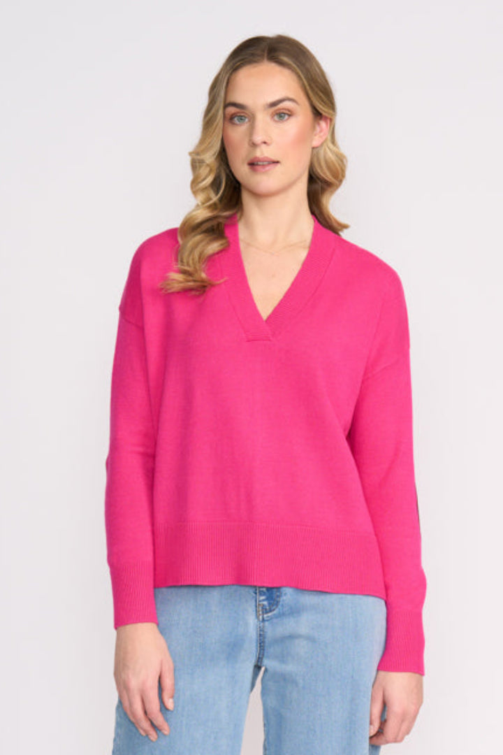 Woman wearing Perfect Patch Sweater in Electric Fuchsia from FOIL FO8458 front view