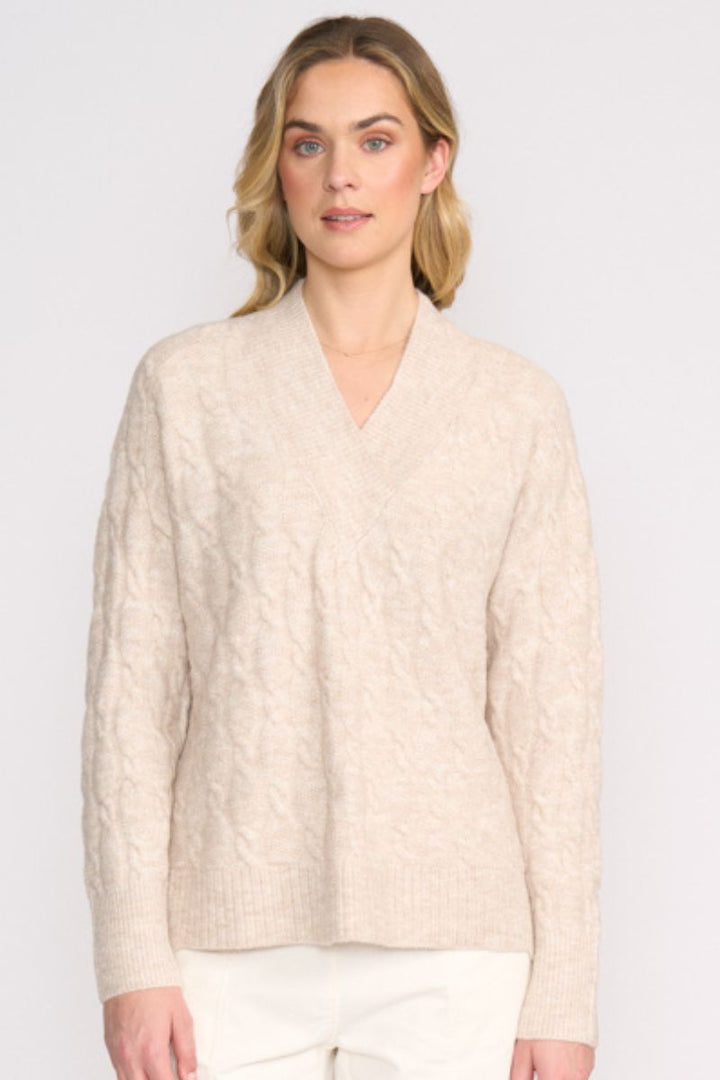 Woman wearing Gauge Your Interest Sweater in Oat by Foil front