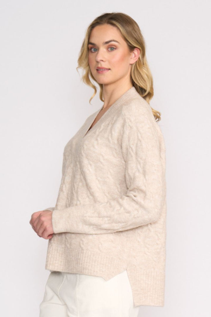 Woman wearing Gauge Your Interest Sweater in Oat by Foil side