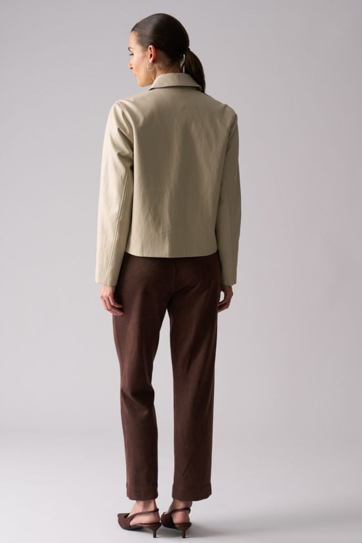 Woman wearing Faux Real Jacket in Stone by Foil back