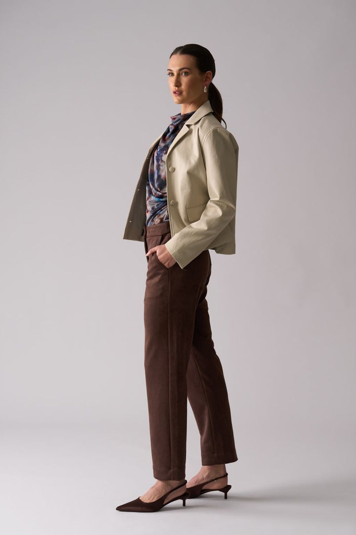 Woman wearing Faux Real Jacket in Stone by Foil side