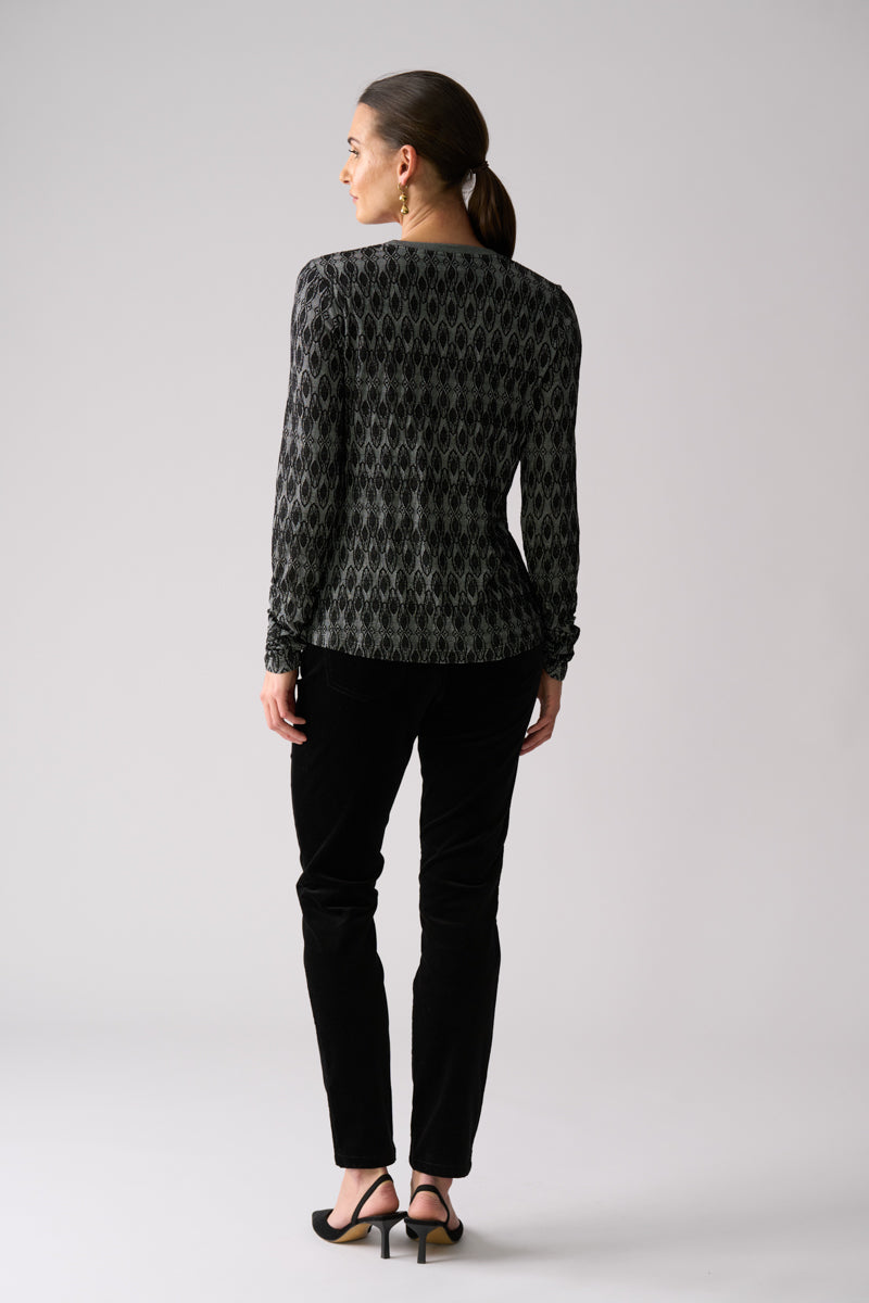 Woman wearing Loominary Long Sleeve Top in Black from FOIL FO8487 back view