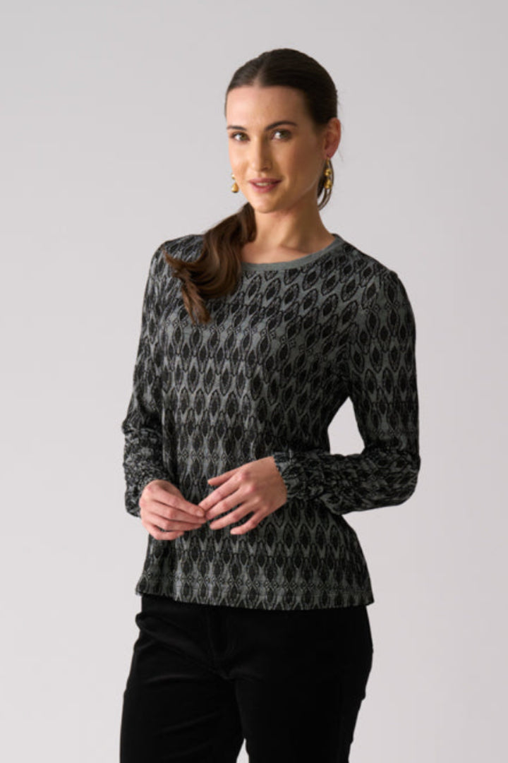 Woman wearing Loominary Long Sleeve Top in Black from FOIL FO8487 front view