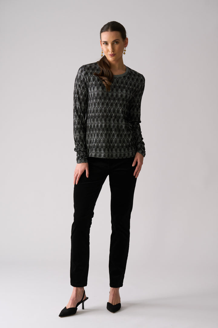 Woman wearing Loominary Long Sleeve Top in Black from FOIL FO8487 outfit styling