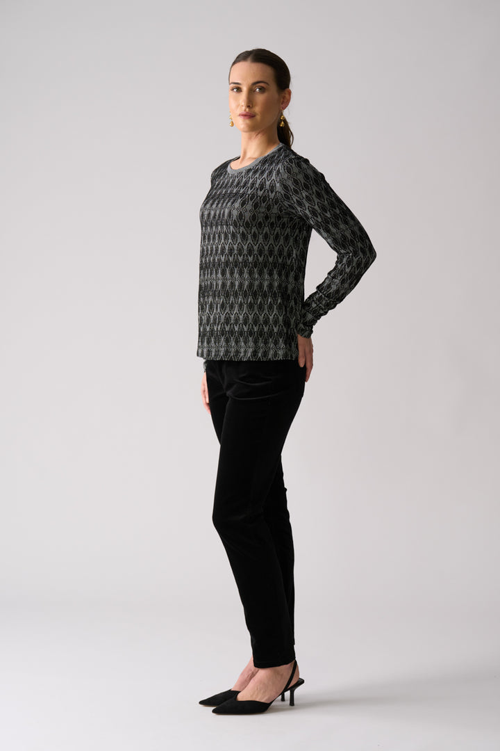 Woman wearing FOIL Loominary Long Sleeve Top FO8487 textured merino knit