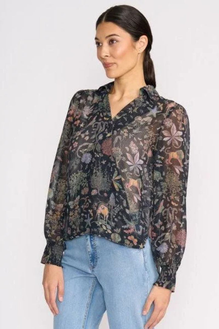 Woman wearing Royal Gala Blouse in Narnia Print by FOIL side