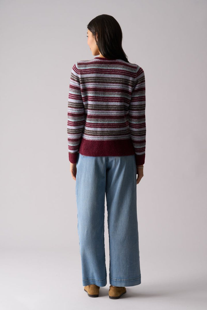 Woman wearing Isle Be Back Cardi in Multi Stripe by Foil back