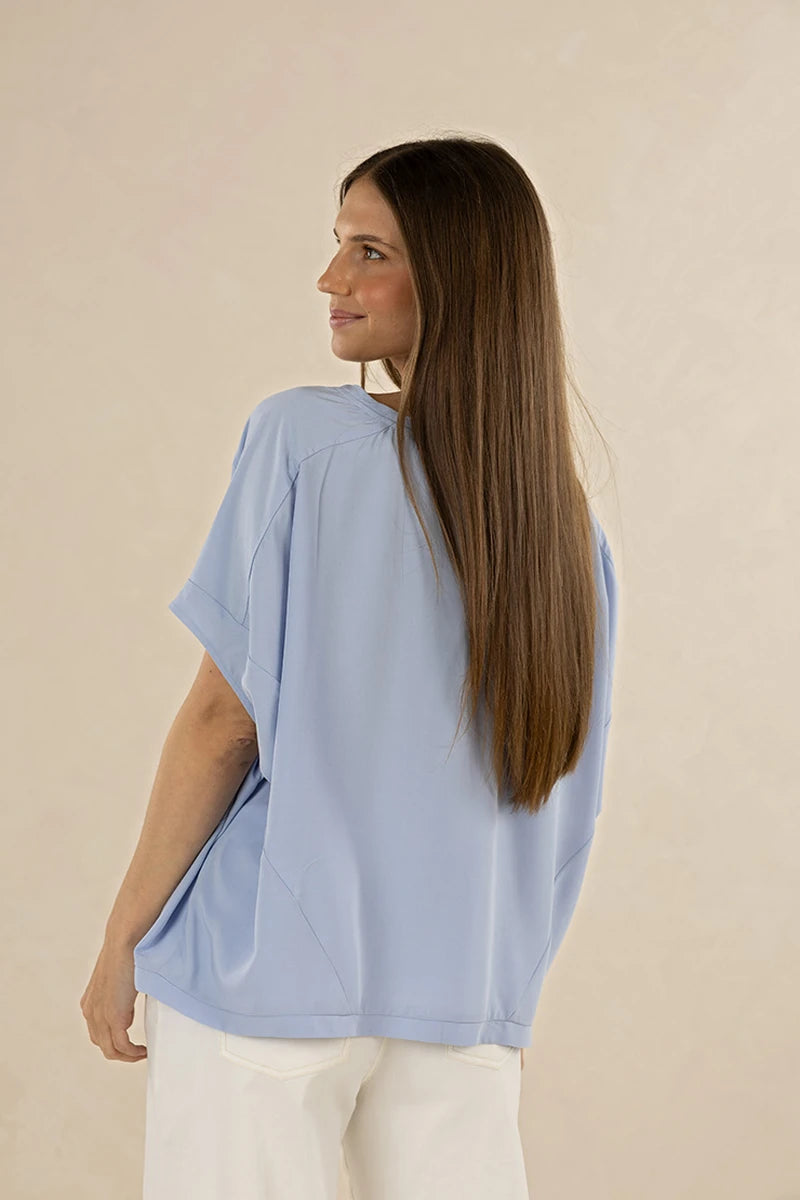 Humidity Lifestyle Lush Top HS2612 in Periwinkle, back view showing oversized silhouette, batwing sleeves and back panel detailing.