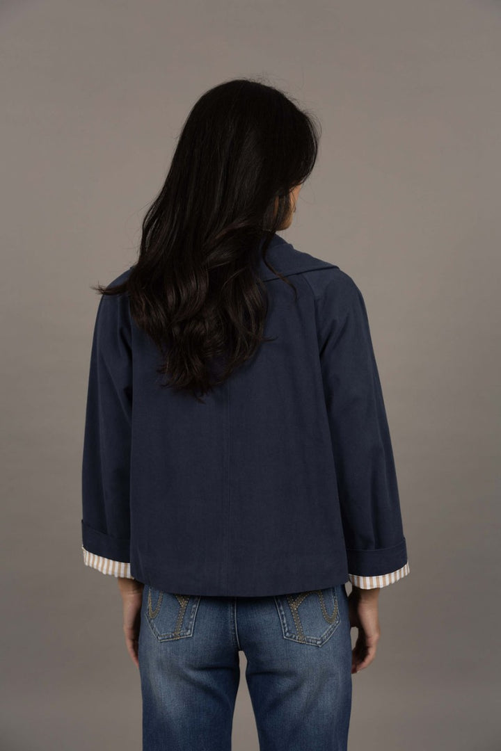Woman wearing Dash Coat in Navy by Humidity Lifestyle HW26126 back view