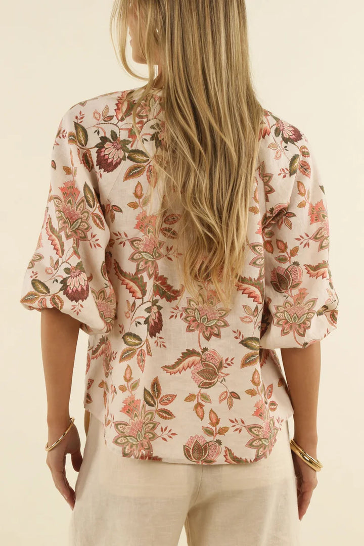 Alt: Humidity Lifestyle Bohemian Rose Linen Blouse HS26204 back view showing relaxed fit, dropped shoulders and botanical print.