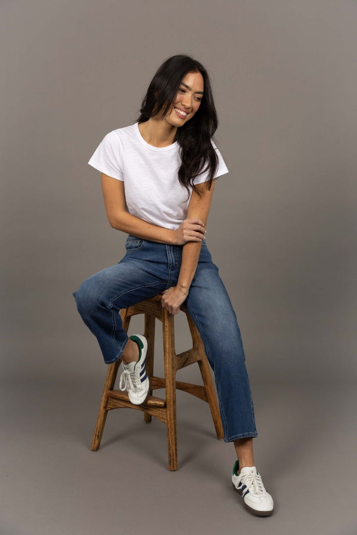 Woman wearing Idol Jean in Mid Blue by Humidity Lifestyle HW26403 casual outfit