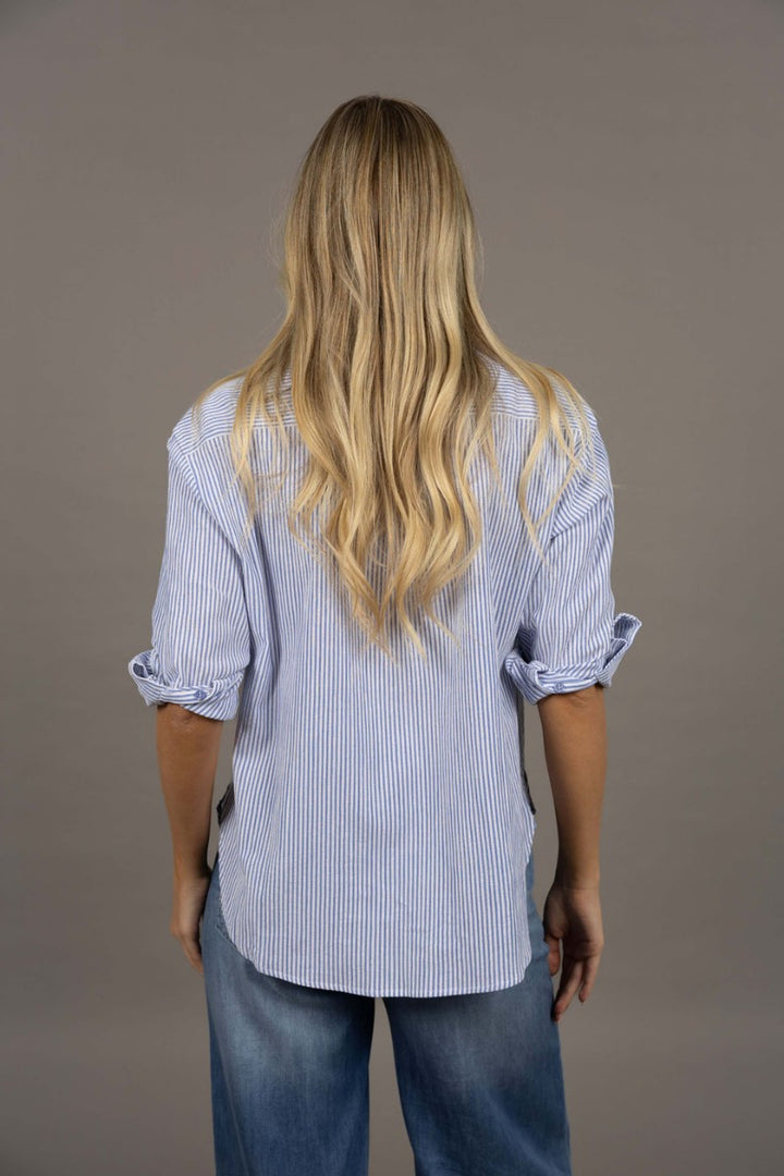 Woman wearing Nala Stripe Shirt in Sky Blue Stripe by Humidity Lifestyle HW26600 back view