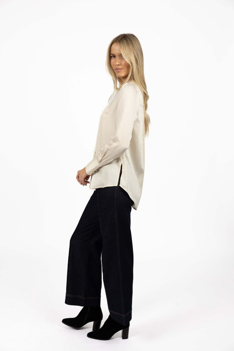 Woman wearing Poppy Shirt in Cream by Humidity Lifestyle HW26151 side view