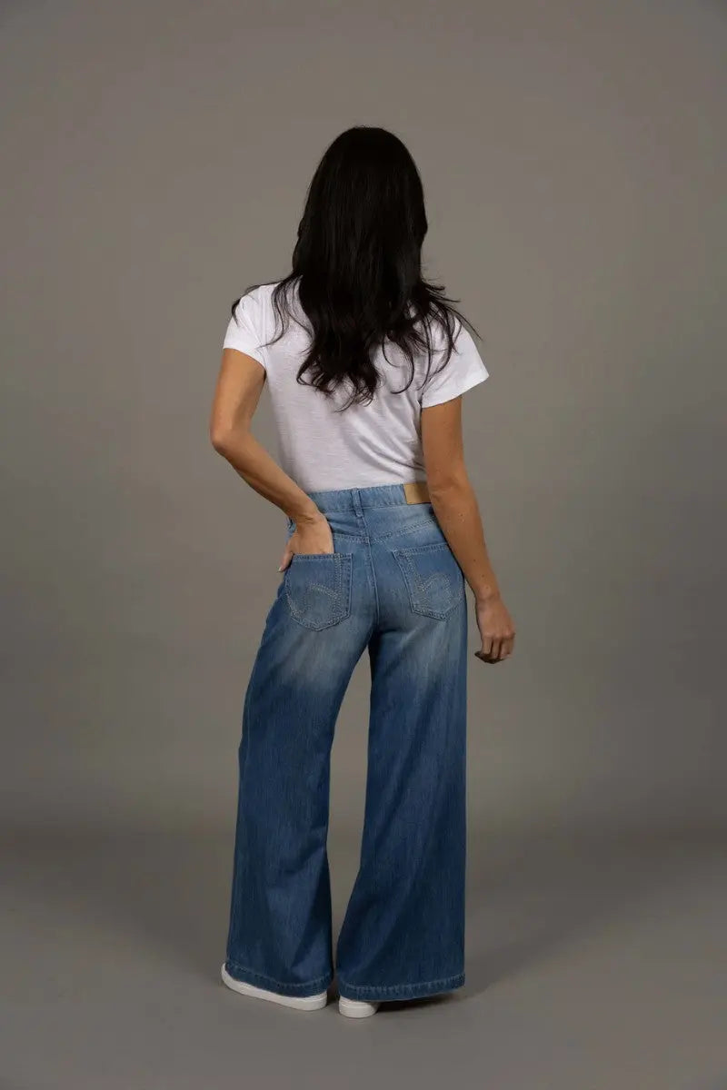 Woman wearing Ryder Jean in Blue Wash by Humidity Lifestyle back