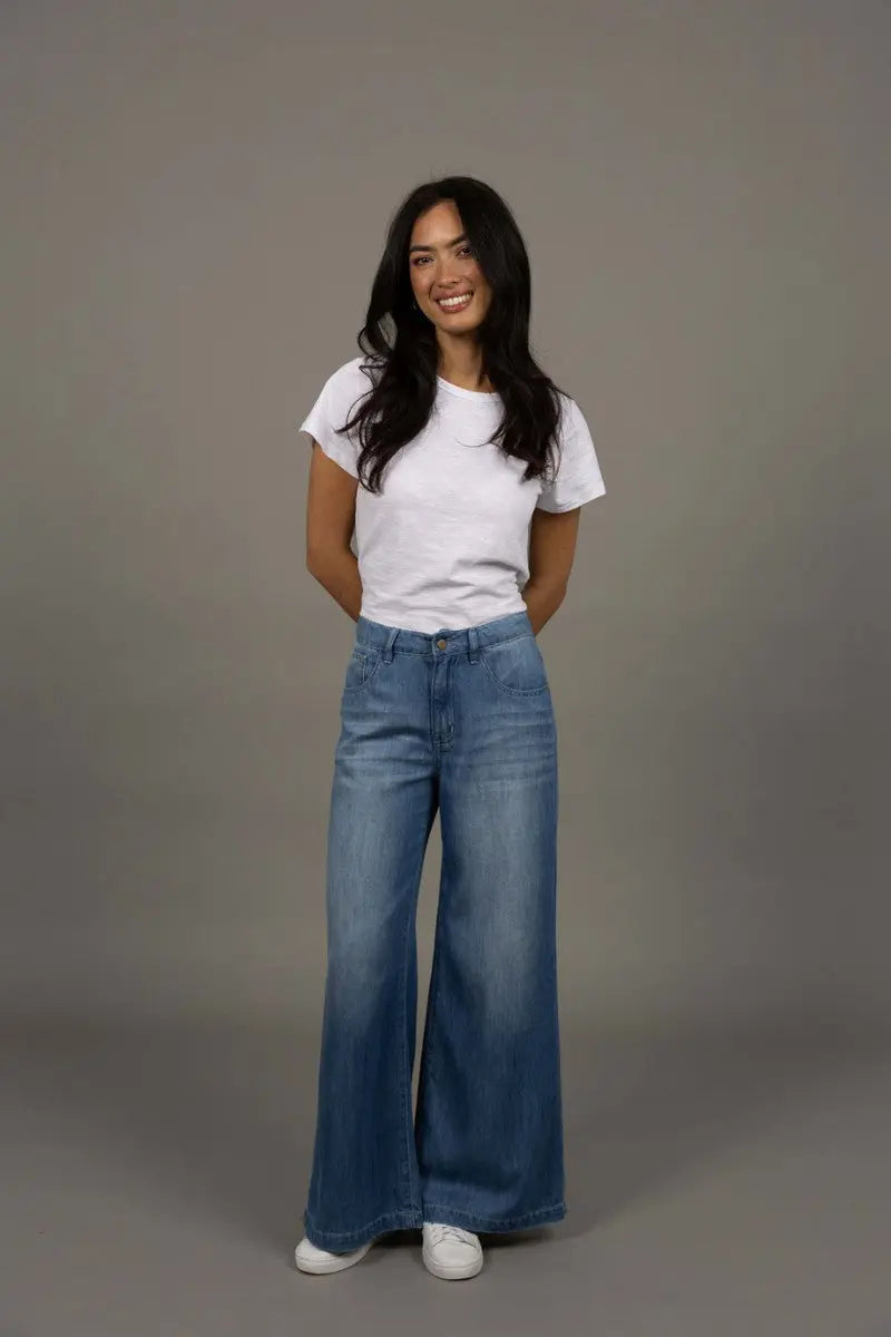 Woman wearing Ryder Jean in Blue Wash by Humidity Lifestyle front HW26400
