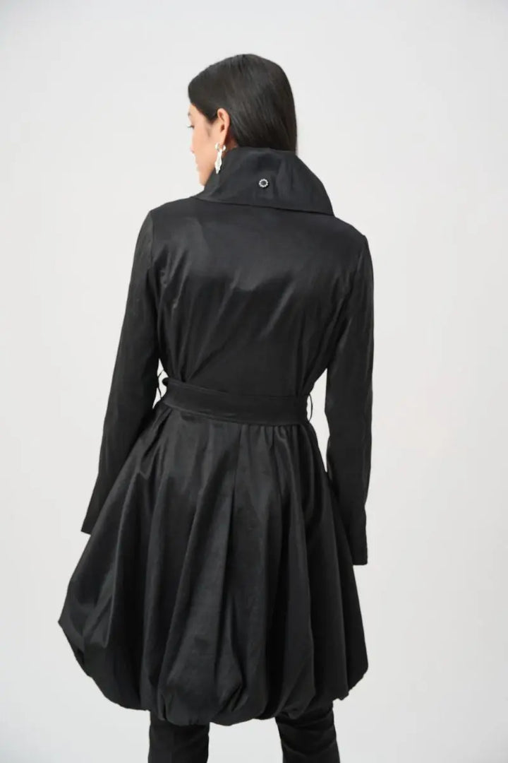 Woman wearing Joseph Ribkoff black stretch taffeta balloon coat back full view