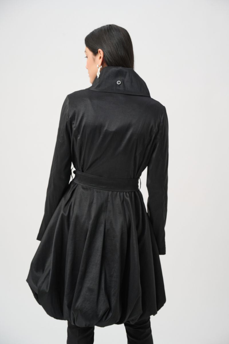Woman wearing Joseph Ribkoff black stretch taffeta balloon coat back full view